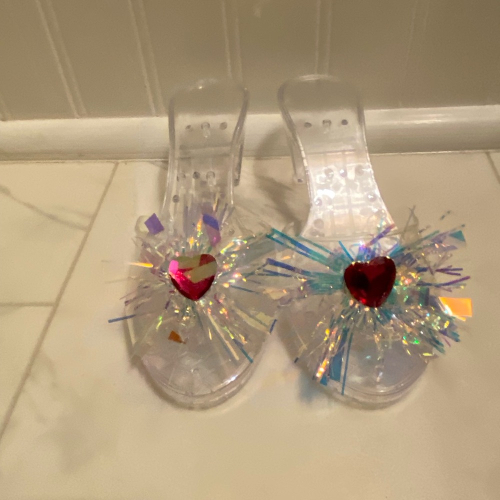 Disney Clear Shoes with Red Heart Embellishments